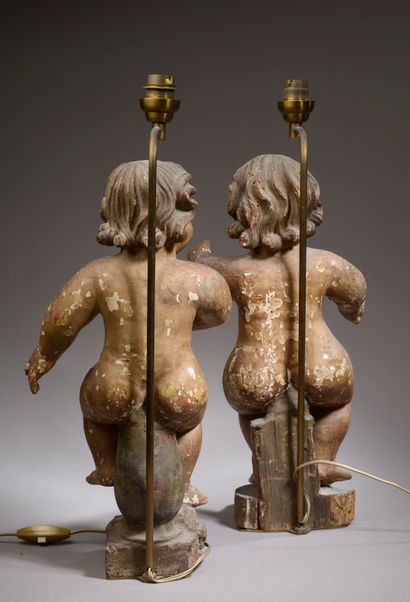 null Deux angelots en bois sculpté, polychromé et doré (vermoulures et accidents).

Espagne,...