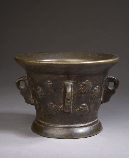 
Mortar in bronze with four holds, two of...