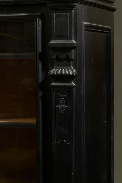 null Blackened wood and ebony veneer display cabinet, opening with two glass doors,...