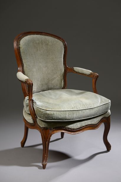 
Cabriolet armchair in molded stained beech,...