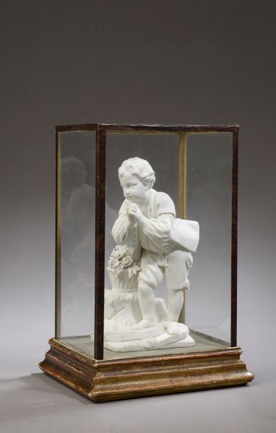 null Statuette in soft porcelain representing the Young Suppliant (chips to the flowers).

Marked...