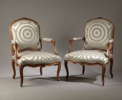 Two armchairs with flat backs in molded and...