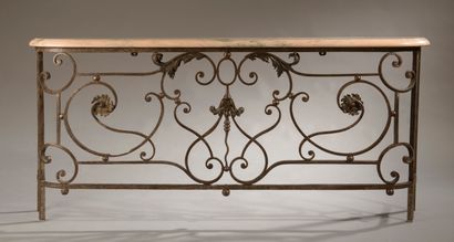 Console formed by a wrought iron balcony...