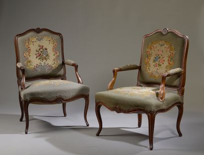 Pair of armchairs in walnut molded and carved...
