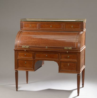 null 
Mahogany and mahogany veneer cylinder desk, opening with three drawers and...