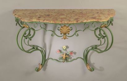 null Console in wrought iron lacquered green, the belt decorated with a shell, with...