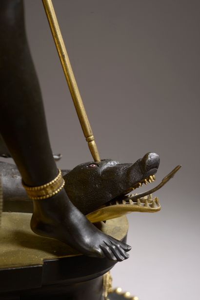 null 
Clock called "L'Amérique" in chased, gilded and patinated bronze, an Amerindian...