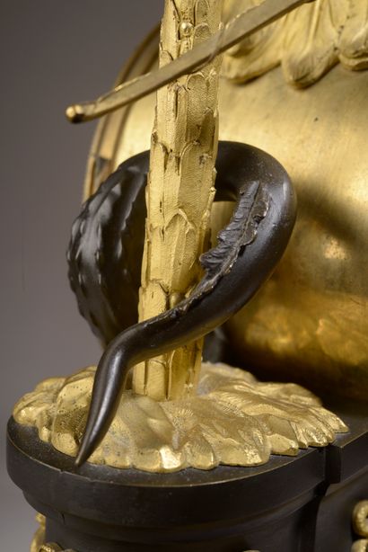 null 
Clock called "L'Amérique" in chased, gilded and patinated bronze, an Amerindian...