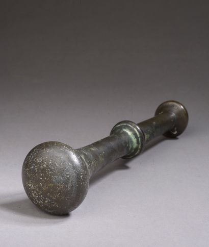 null 
Mortar in bronze with four holds, two of which are pierced, the body applied...