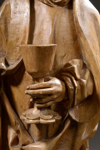 null 
Saint Jean en tilleul sculpté, le dos creusé (manque la main droite, restaurations,...