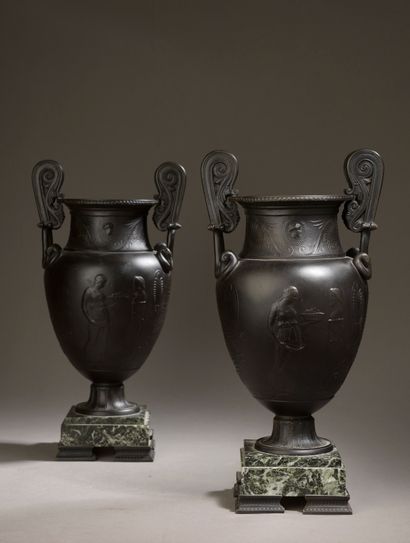 Pair of crater vases in dark brown patinated...