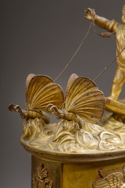 null Clock called "Psyche's chariot led by Love" in chased and gilded bronze. The...