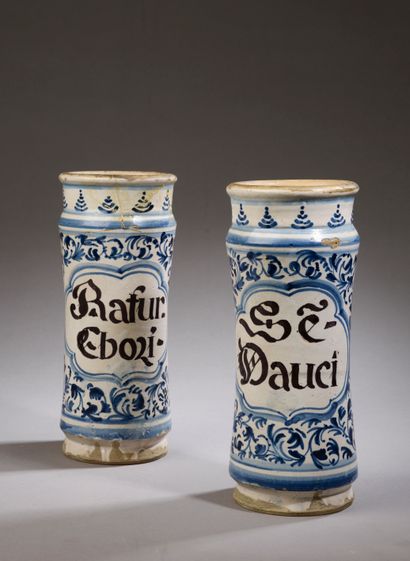 Pair of white and blue enamelled earthenware...