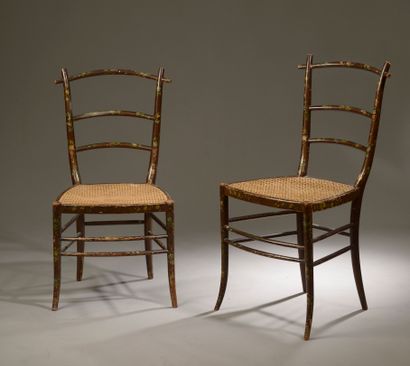 null Pair of caned chairs in lacquered and painted wood decorated with flowers (wear)....