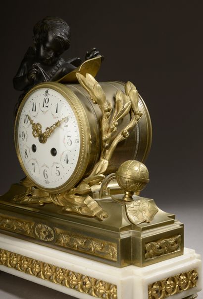 null White marble and gilded bronze mantel set. The clock with a circular enamelled...