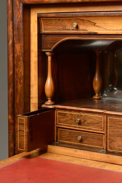 null Secretary in rosewood veneer inlaid with holly wood decorated with foliage scrolls,...