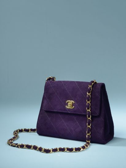 null CHANEL "Timeless".

Shoulder or sling bag, in quilted purple suede, one main...
