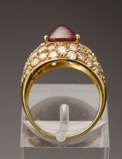 null Dome ring in 18k yellow gold set with a sugarloaf-cut rubellite tourmaline in...