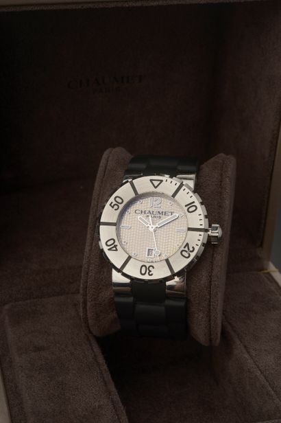 null CHAUMET "Class One".

Wristwatch, round steel case, silver dial with stripes...