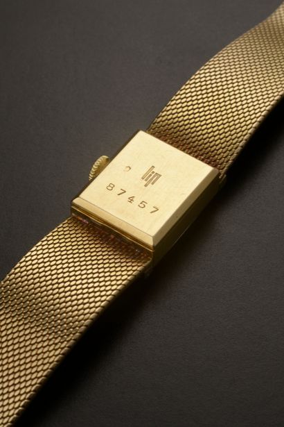 null LIP.

18k yellow gold wristwatch, the rectangular case highlighted with modern...