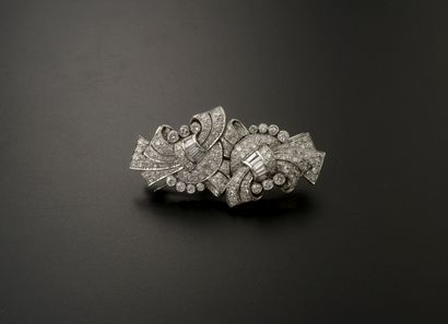 null Brooch transformable into a double clip in 18k white gold, 800 thousandths platinum...