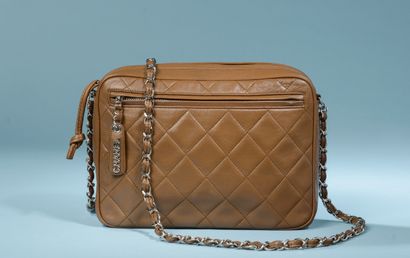 CHANEL Paris.

Chanel camera bag quilted...