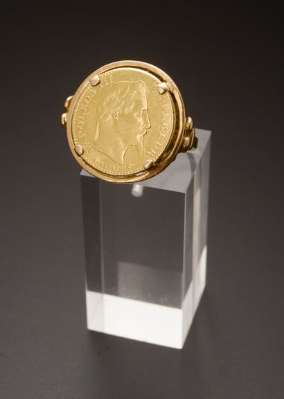 null Ring in 18k yellow gold set with a 10 francs gold coin with the profile of Napoleon...