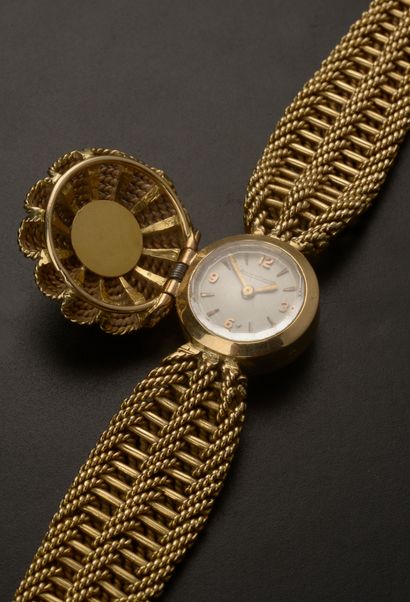 null JAEGER-LECOULTRE.

18k yellow gold secret wristwatch, the round case concealed...