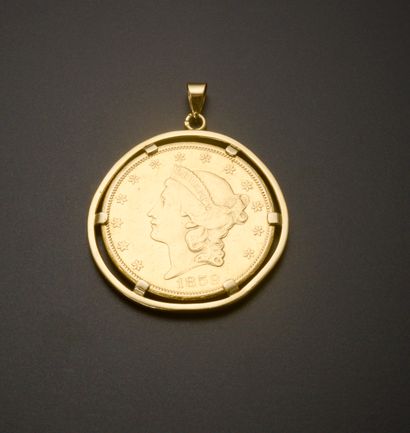 null Pendant in 18k yellow gold presenting a gold coin of 20 American Dollars with...