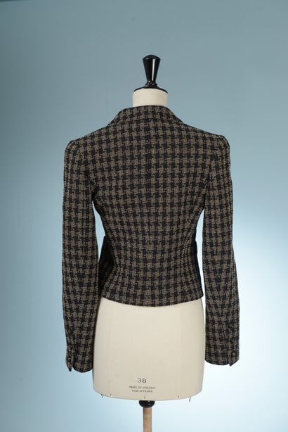 null CHANEL Boutique.

Wool blend jacket textured with checks in shades of navy blue...