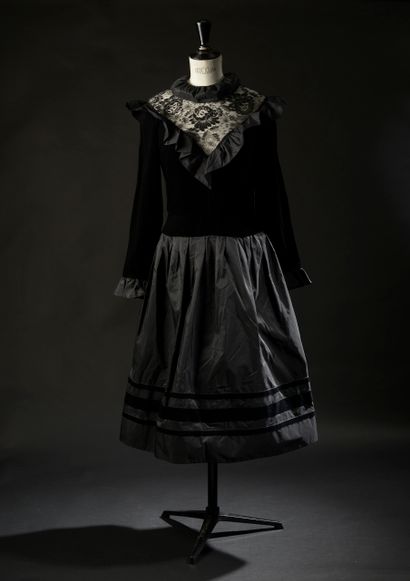 NINA RICCI Haute Boutique. 

Black dress...