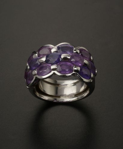 18k white gold ring set with oval amethysts...