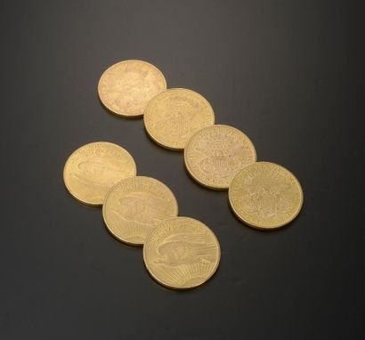 null 
Sept pièces en or de 20 Dollars américains, une datant de 1876, une de 1877,...