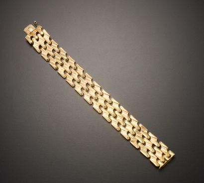 Bracelet en or jaune 18k à trois rangs de...