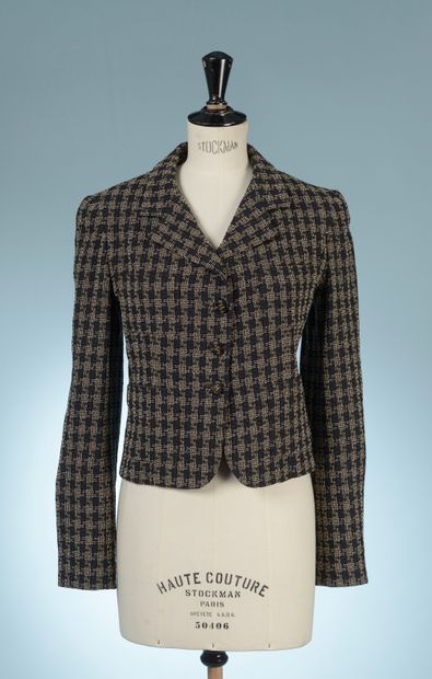 CHANEL Boutique.

Wool blend jacket textured...