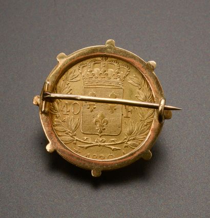 null Brooch in 14k yellow gold presenting a gold coin of 40 Francs with the profile...