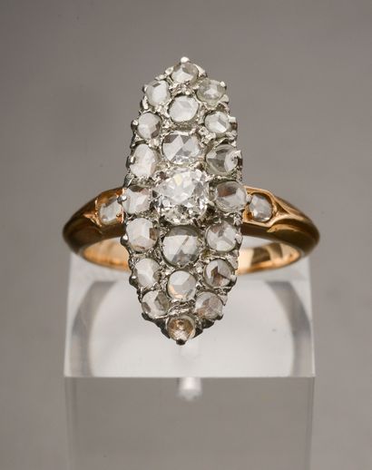 null Marquise ring in 18k yellow gold with a brilliant-cut diamond in a setting of...