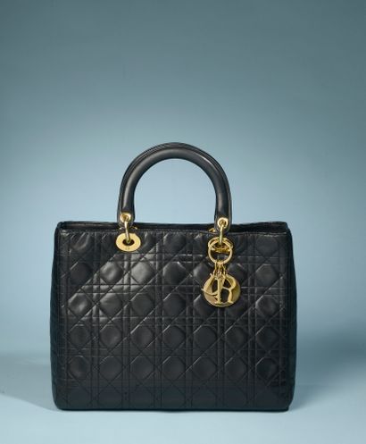 null CHRISTIAN DIOR "Lady Dior".

Large bag in black lambskin leather overstitched...