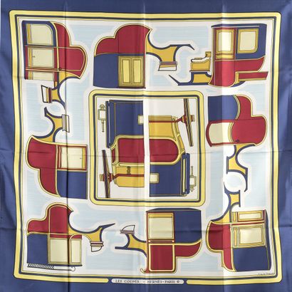 null HERMÈS "Les Coupés".

Silk square in blue, burgundy and yellow tones, signed...