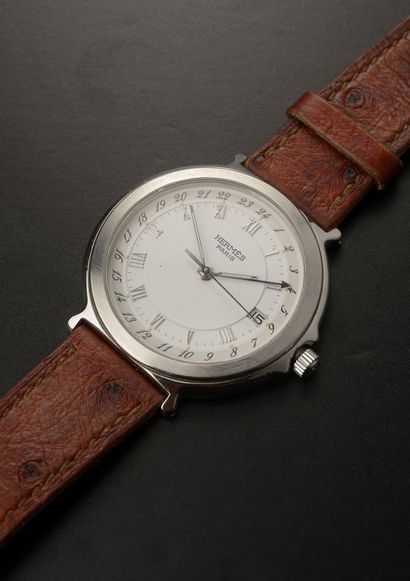 null HERMÈS.

Wristwatch, round stainless steel case, white dial with Arabic and...