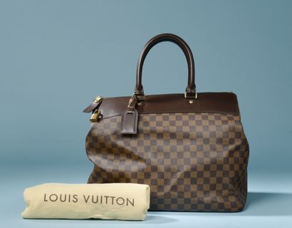 null LOUIS VUITTON "Greenwich".

Travel bag in ebony coated canvas and smooth chocolate...