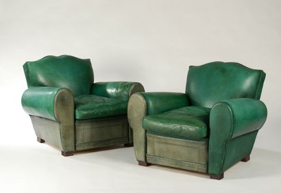 Pair of club chairs, the sloping backrest...