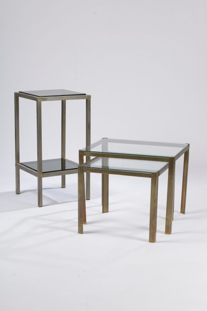 null Two nesting tables forming ends of brass sofa, the legs in round square, the...