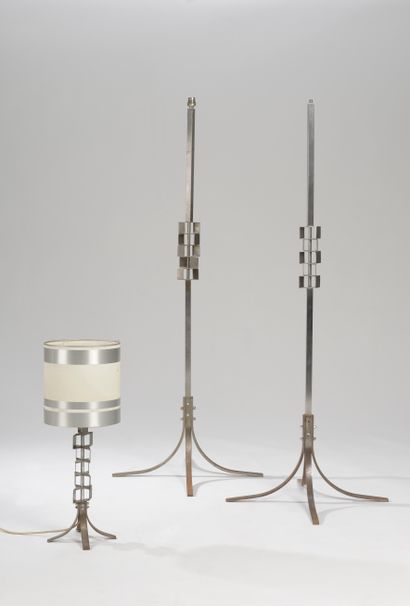 null Pair of steel floor lamps, the central stem of square section decorated in its...