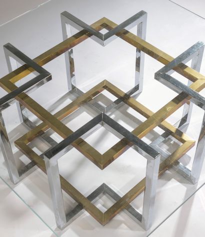 null Coffee table with a square glass top (chips) resting on a square chromed and...