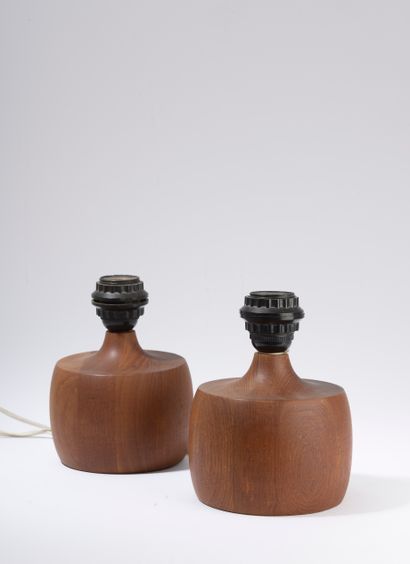 Pair of teak table lamps turned into a bulging...