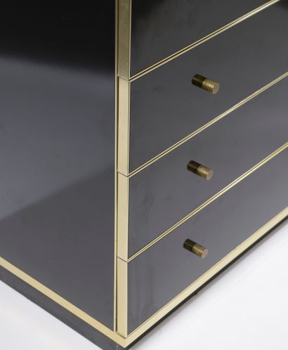 null Large chest of drawers laminated black gloss, the frames and knobs in gilded...