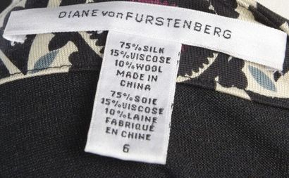 null DIANE VON FURSTENBERG.

Black dress with cream, blue and purple floral inserts,...
