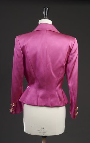 null GUY LAROCHE.

Fuchsia pink satin jacket, closed with rhinestone jewel buttons...