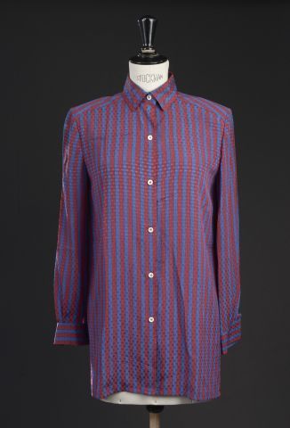 null CHRISTIAN DIOR Boutique.

Blue and plum colored striped silk shirt, closed with...